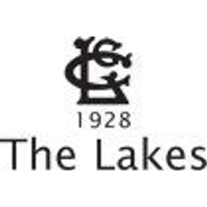 The Lakes Golf Course logo: A black interlocking monogram of the capitals L, G and C drawn in ornate curled strokes with ball terminals, above the year 1928 in small black figures and the words The Lakes in a light black sans-serif.
