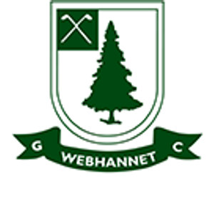 Webhannet Golf Club logo: Dark green heraldic shield: crossed golf clubs in the upper-left canton, a tall pine tree filling the main field, and a banner ribbon below reading 'WEBHANNET' flanked by the letters G and C; dark green and white only.