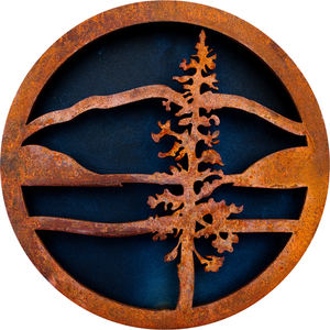 Hayden Lake Country Club logo: A circular rusted-steel medallion over a dark navy field: a corroded orange-brown ring encloses a mountain ridgeline across the top, a tall sparse pine tree right of center, and three horizontal bars suggesting lake water across the lower half, all cut in weathered rust-colored steel.