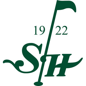 Sunset Hills Country Club logo: A dark green flagstick topped with a waving flag splits the year numerals 19 and 22, its shaft passing down between a large swash script S and an italic serif H and ending in a small oval cup at the base; dark green only on transparent.