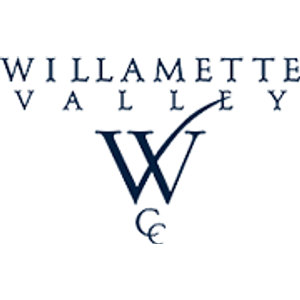 Willamette Valley Country Club logo: The words 'WILLAMETTE VALLEY' in widely letterspaced navy serif capitals, the elongated tail of the letter Y sweeping down in a thin curve through a large navy serif letter W below, with two small interlocked letter Cs beneath the W; navy on white.