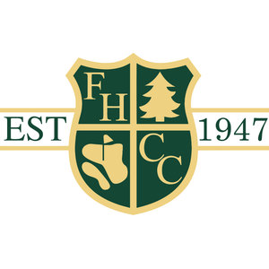 Forest Heights Country Club logo: A dark green shield edged in pale gold and quartered by a gold cross: the letters F and H in the upper-left quarter, a gold pine tree in the upper-right, a putting green outline with a flagstick and a bunker shape in the lower-left, and the letters C and C in the lower-right; a white banner crosses behind the shield reading 'EST' on the left and '1947' on the right in green serif letters.