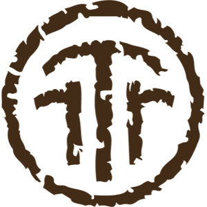 Talking Rock Golf Club logo: A dark brown ring with rough torn edges enclosing the ragged letters T and R drawn like a cattle brand; dark brown on white.