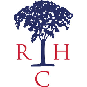 Round Hill Club logo: A navy blue tree with a broad, densely leafed canopy, flanked at the trunk by the red serif letters R and H, with a red letter C centered below the ground line; navy and red on white.