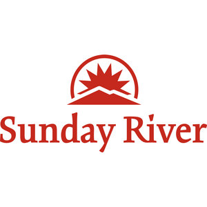 Sunday River Golf Club logo: A red semicircular arch containing a sun with jagged triangular rays rising above white mountain-ridge cutouts, above the words 'Sunday River' in red serif letters.