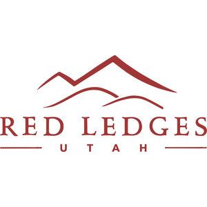 Red Ledges logo: A range of overlapping mountain peaks drawn as tapering brick-red brushstrokes, a tall central summit above two lower foothill ridges, over RED LEDGES in widely letterspaced serif capitals with U T A H beneath, flanked left and right by thin horizontal rules.