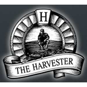 The Harvester Golf Club logo: On a dark grey square plate, a black-and-white engraving of a hatted figure kneeling in a furrowed field inside an arched sunburst of radiating rays, a white serif H on a small tablet at the top, and a white ribbon banner below lettered THE HARVESTER.