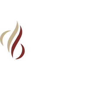 Desert Blume Golf Course logo: A stylized desert bloom of four flame-like fronds, two in sandy tan and two in deep brick red, curving upward together like a flower bud or a flame.