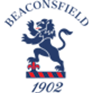 Beaconsfield Golf Club logo: A navy blue lion rampant facing left with a red tongue, standing over a red fleur-de-lis on a bar of diagonal red and navy stripes, with BEACONSFIELD arched above in navy serif capitals and 1902 in navy italic numerals below.