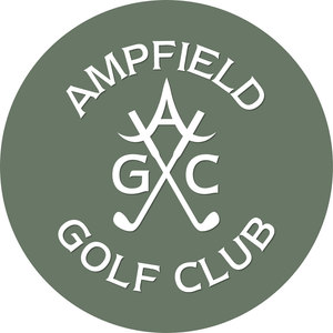 Ampfield Golf & Country Club logo: A sage green circular badge with white text "AMPFIELD" arched above and "GOLF CLUB" arched below, enclosing two crossed golf clubs forming the letter A between the white letters G and C.