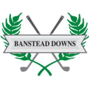 Banstead Downs Golf Club logo: A grey banner reading Banstead Downs in black serif capitals, flanked by green laurel fronds above two crossed grey golf clubs.
